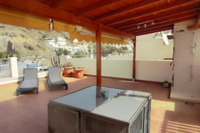 Paraíso con gran solarium privado en playa Mogán